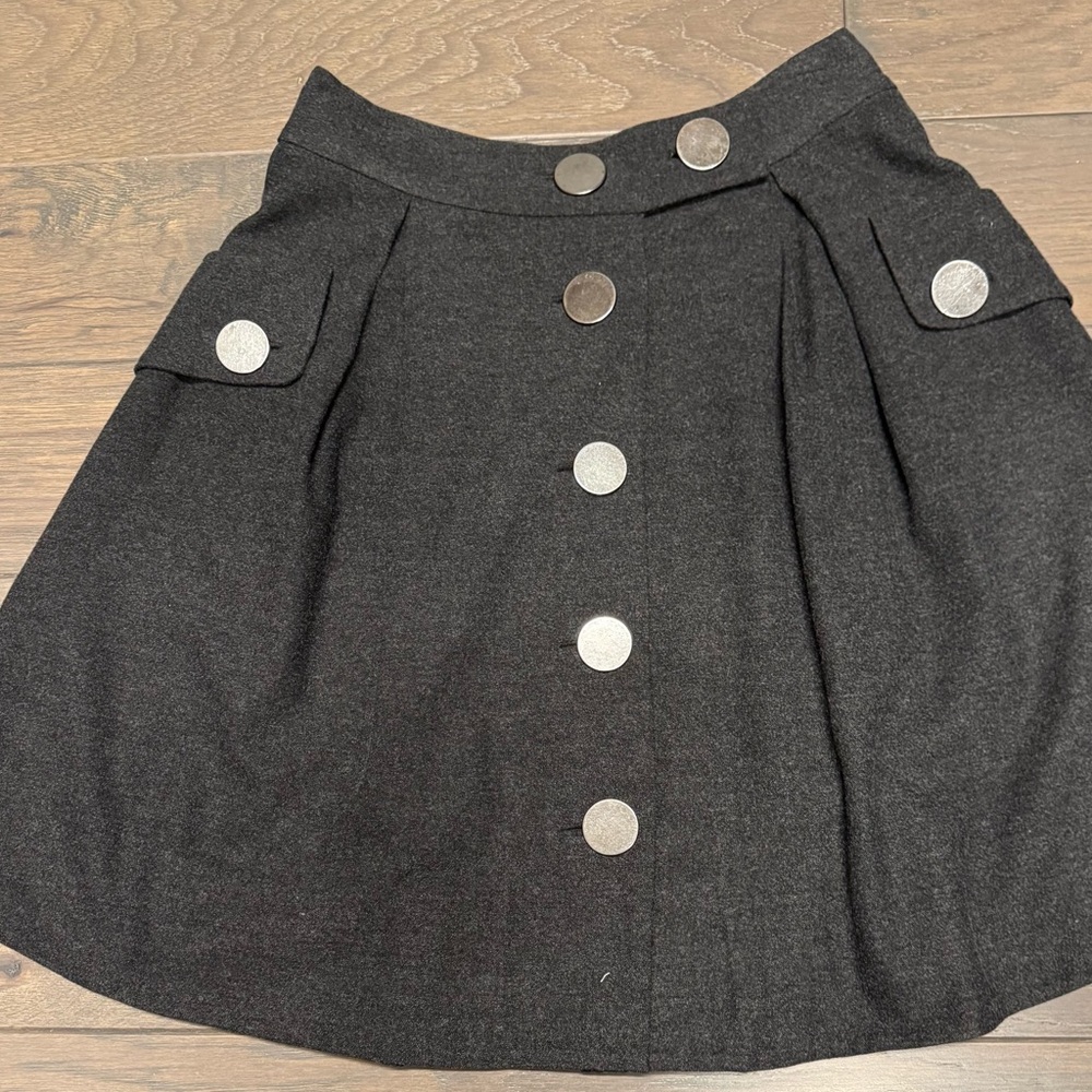 Stylish Black Button-Up Skirt. Excellent condition . Fully lined . Worn once